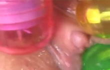 Three small sex toys on her clit